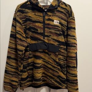 The North Face Black and Gold Striped Fleece Jacket